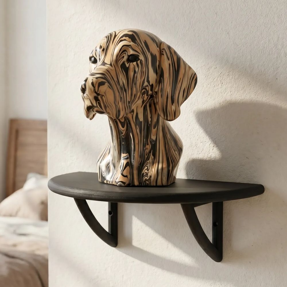 Black curved wall display shelf holding a brown and black marbled dog head sculpture