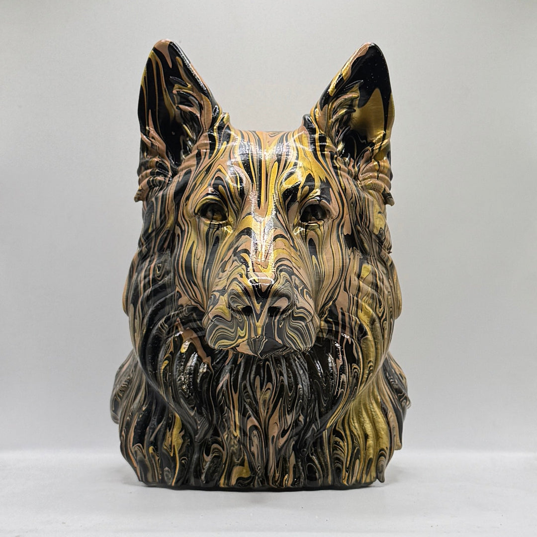 Front view of a hand-painted German Shepherd head ornament in black and gold