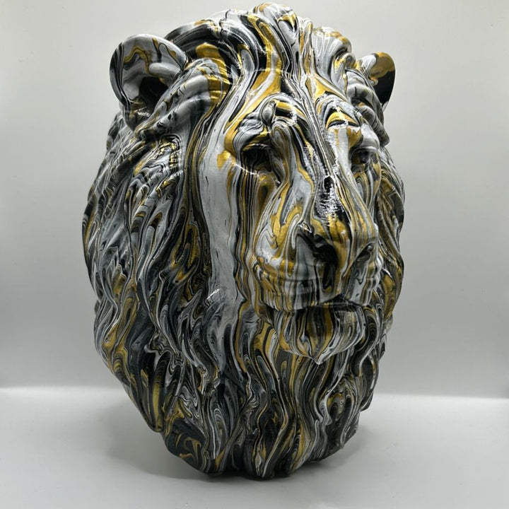 Hand-painted lion sculpture in black, white and gold