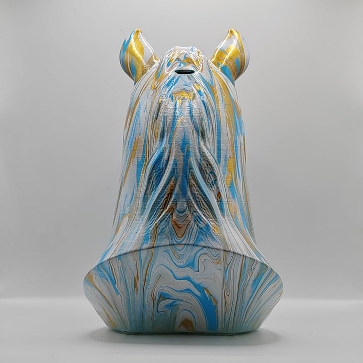Rear view of a horse head sculpture with blue, white and gold marbling along the mane