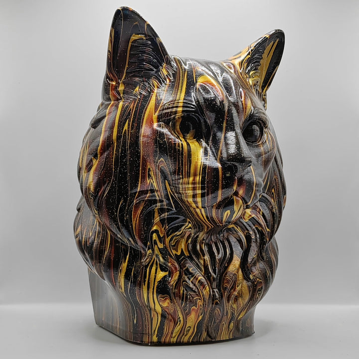 Black, gold and brown Ragdoll cat statue, angled view